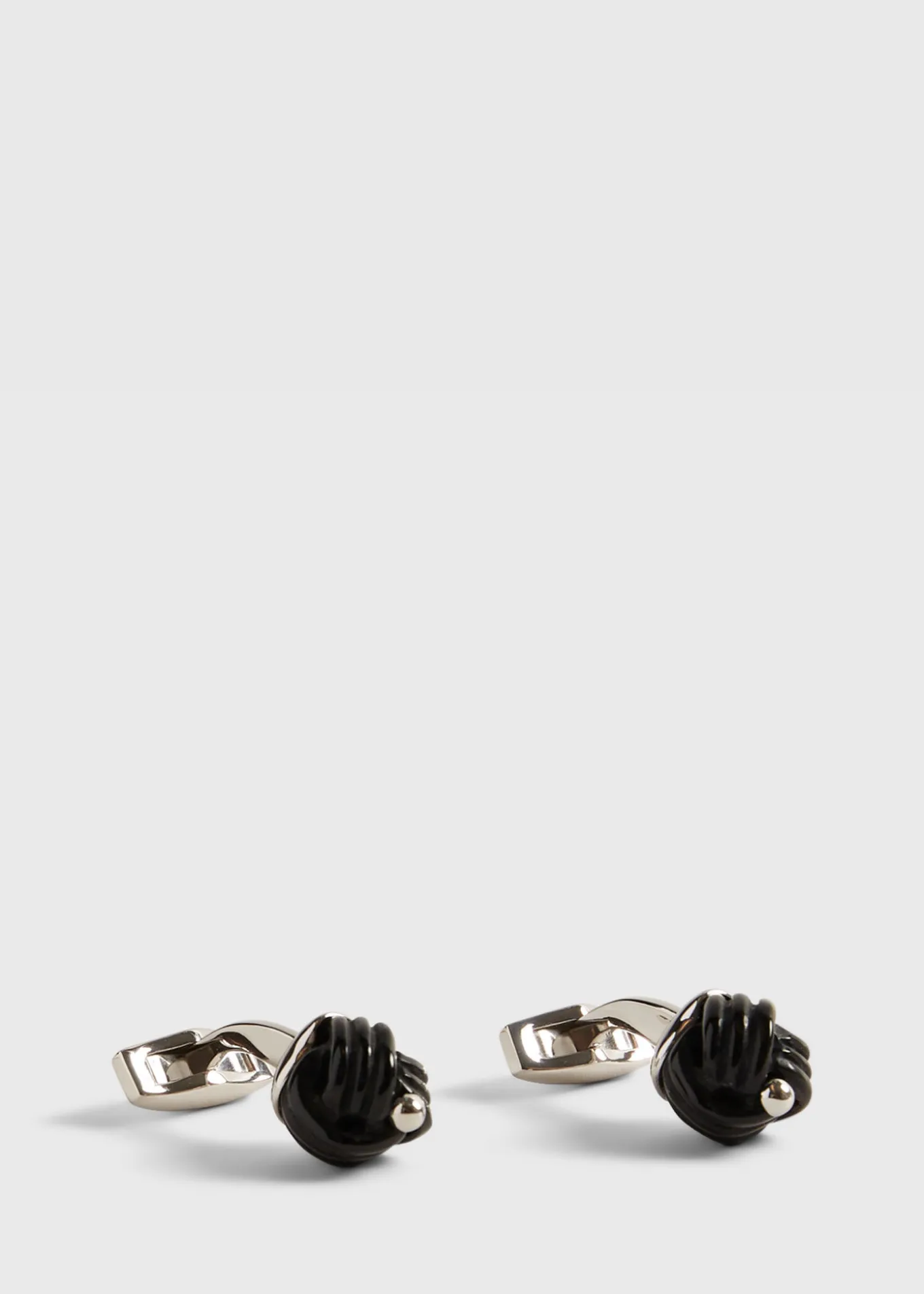 sterling_silver_with_blac_0.webp Sterling Silver With Black Onyx Carved Knot