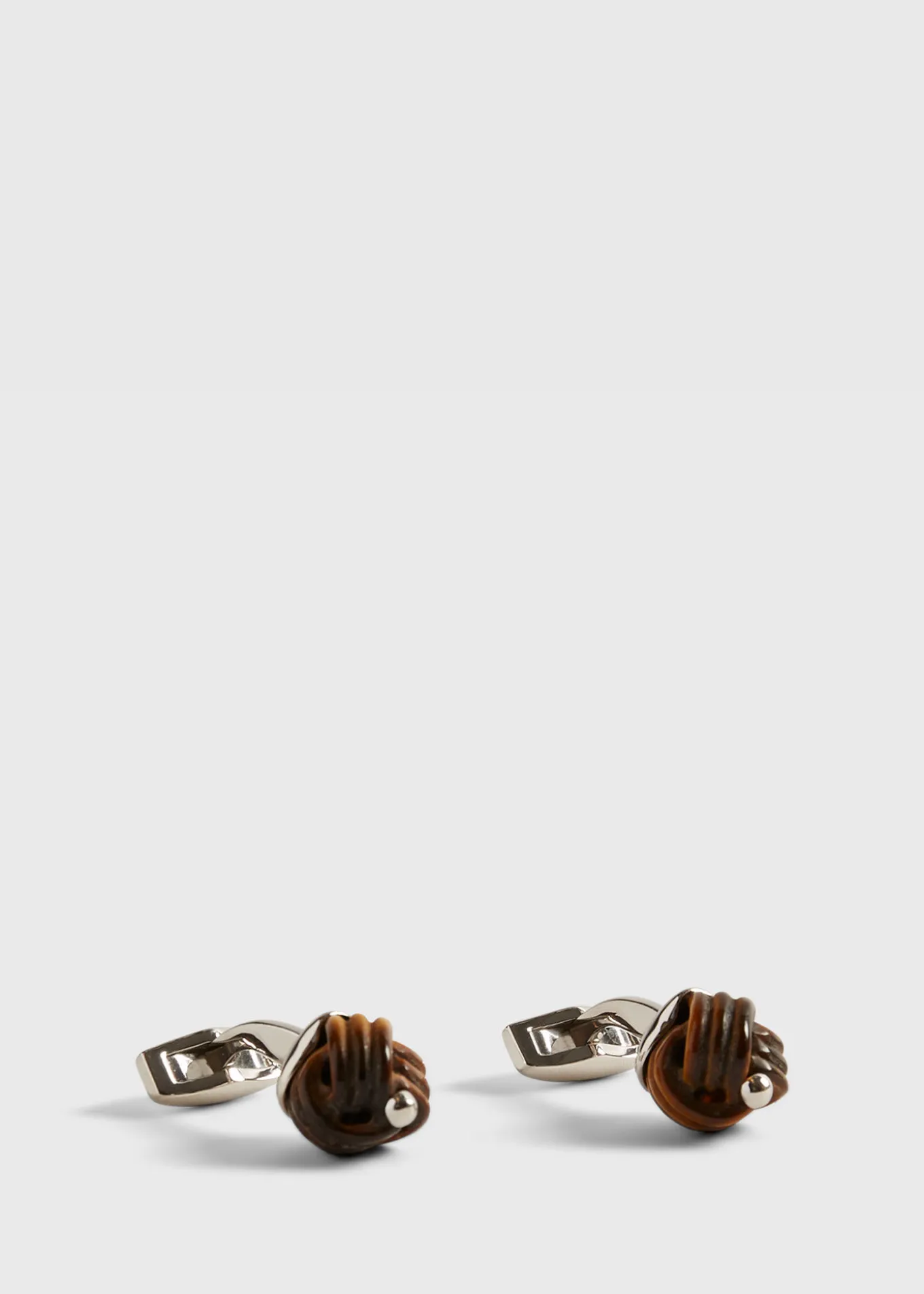 sterling_silver_with_tige_0.webp Sterling Silver With Tiger Eye Carved Knot